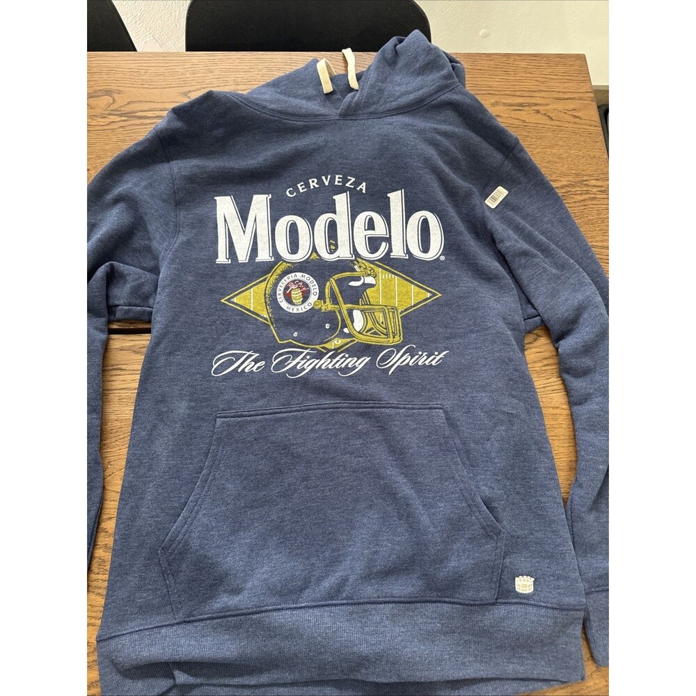 NEW!  MODELO CERVEZA "THE FIGHTING SPIRIT" FOOTBALL SZ L HOODED BLUE SWEATSHIRT!